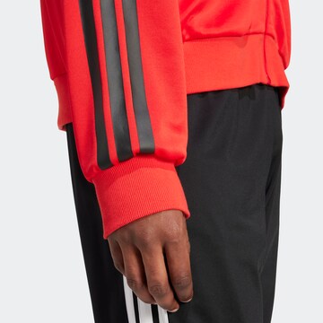 ADIDAS SPORTSWEARJakna za vježbanje 'House of Tiro' - crvena boja