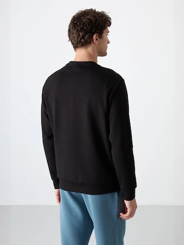 Felpa di Tommy Life in nero