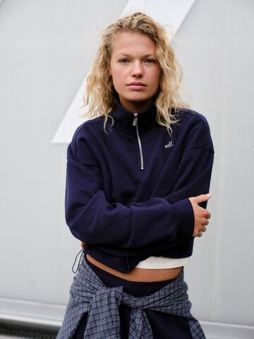 Sweat-shirt self. en bleu