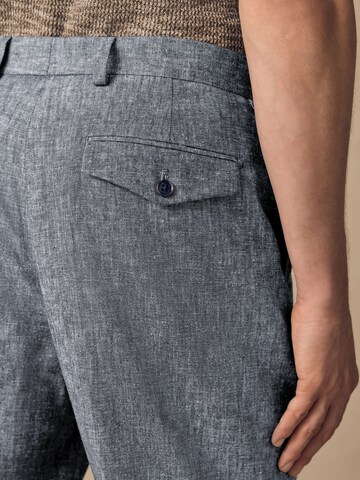 Slimfit Pantaloni con pieghe di Next in blu