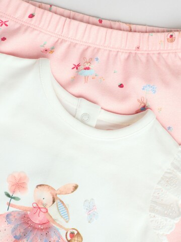 Set Next en rose