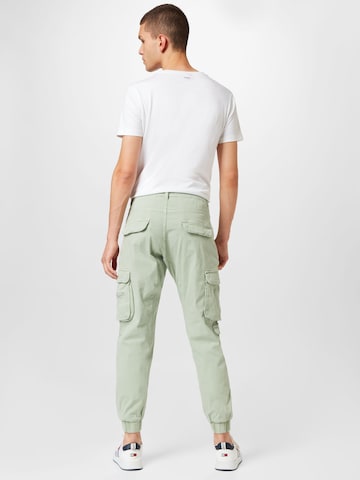 Cotton On - Tapered Pantalón cargo en verde