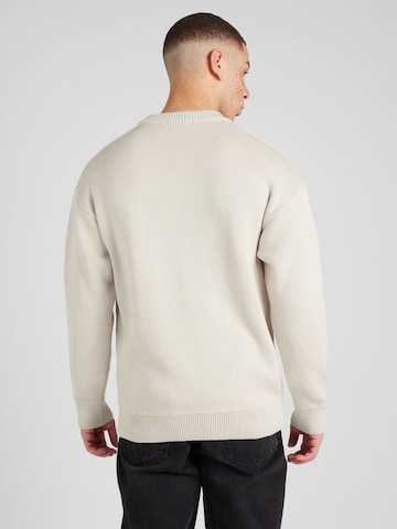 Pegador Sweter w kolorze beżowy