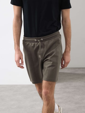 regular Pantaloni di Marks & Spencer in verde