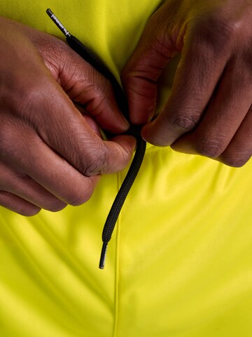 Regular Pantalon de sport 'AUTHENTIC' Hummel en jaune