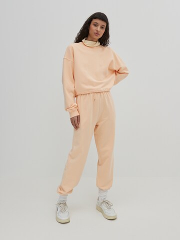 EDITED Sweatshirt 'Pearl' in Oranje