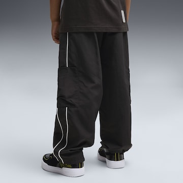 PUMA Loosefit Sporthose 'Puma x Transformers' in Schwarz