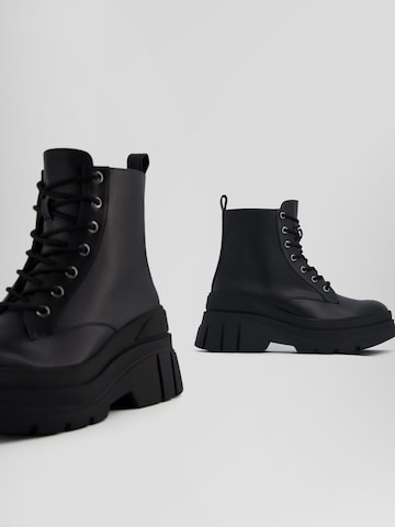 Bershka Lace-Up Ankle Boots in Black