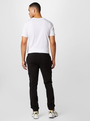 SOS Ozke Funkcionalne hlače 'Laax' | črna barva