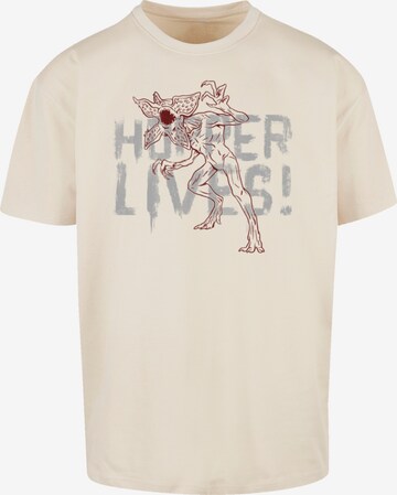 F4NT4STIC Shirt 'Stranger Things Hoppers Live Netflix TV Series' in Beige: voorkant