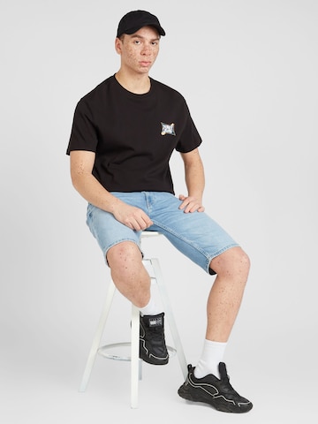 Tommy Jeans T-Shirt 'FLOWER POWER' in Schwarz