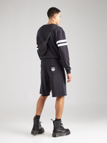 ELLESSE Loosefit Shorts 'Tems' in Schwarz