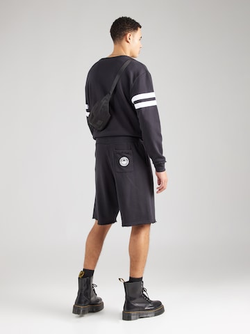 ELLESSE Loose fit Pants 'Tems' in Black