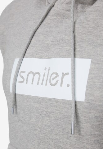 smiler. Kapuzensweatshirt 'Happy' in Grau