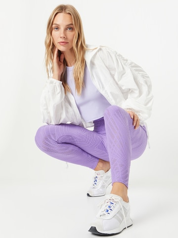 Skinny Pantaloni sportivi 'Selenite' di Onzie in lilla