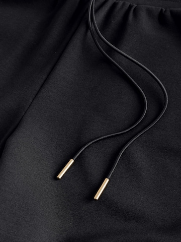 Next - Perna larga Calças em preto