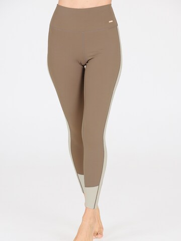 Skinny Pantalon de sport 'Aspasia' Athlecia en marron : devant