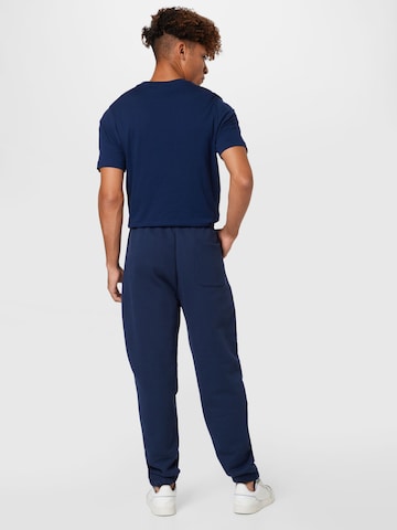 Effilé Pantalon Tommy Jeans en bleu