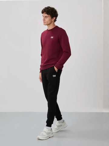 Tommy Life Joggingpak in Rood