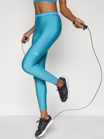 UNDER ARMOUR - Skinny Calças de desporto em azul