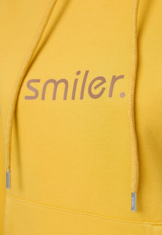 Sweat-shirt 'Happy' smiler. en jaune