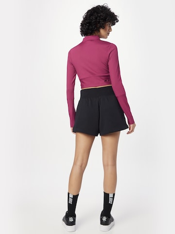 Nike Sportswear Loosefit Housut 'Phoenix Fleece' värissä musta