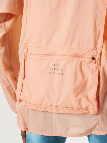 NIKE Športna jakna | oranžna barva