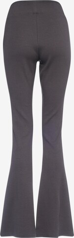 Karl Kani Rozkloszowany krój Spodnie w kolorze szary