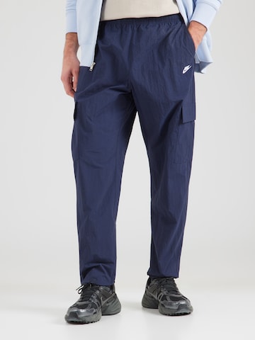 Nike Sportswear Alt kitsenev Klapptaskutega püksid 'CLUB', värv sinine: eest vaates