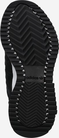 Baskets basses 'Retropy F2' ADIDAS ORIGINALS en noir