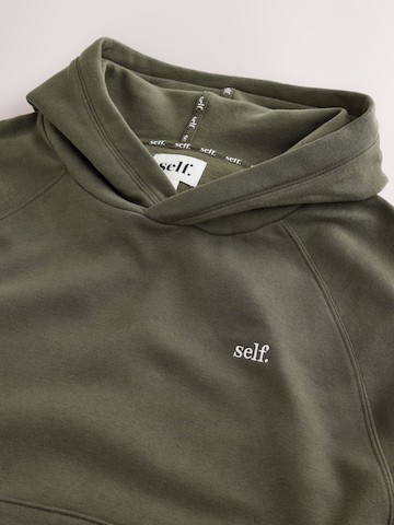 Pullover di self. in verde