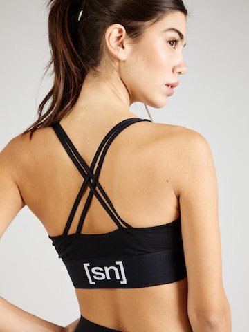 super.natural Bralette Sports Bra in Black