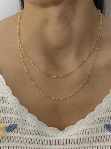 Chaîne caï en or : devant