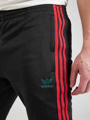 Tapered Pantaloni 'Adicolor Classics' di ADIDAS ORIGINALS in nero