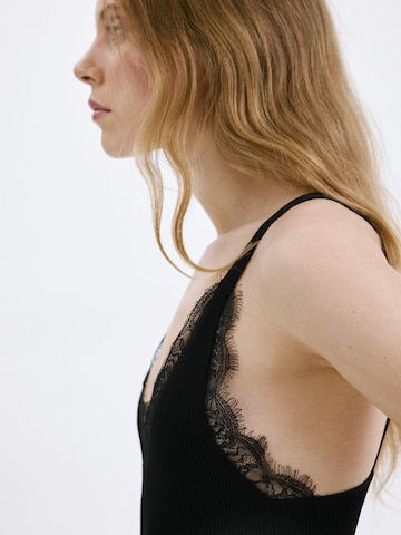 Tops en tricot 'CURCUMA' MANGO en noir