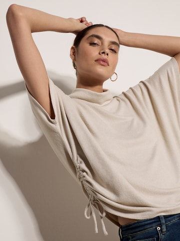 Pull-over ' ' Apricot en gris
