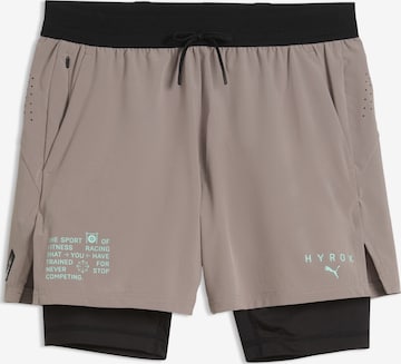 Pantalon de sport PUMA en beige : devant