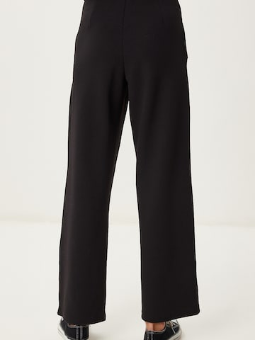 Happiness İstanbul Loose fit Trousers in Black