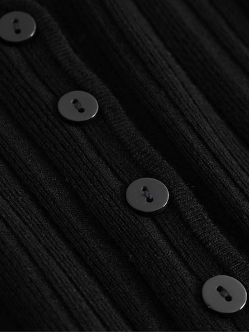 Noella - Top ' N-Melvie ' en negro