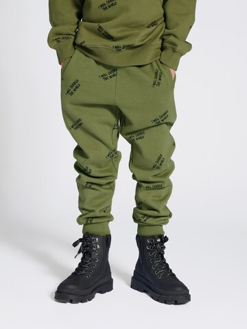 SOMETIME SOON Tapered Pants 'MILOS' in Green: front