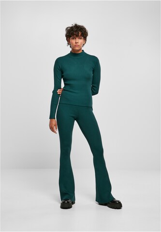 Urban Classics - Acampanado Pantalón en verde