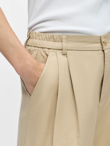 Wide leg Pantaloni con pieghe 'OBJIryna' di OBJECT in beige