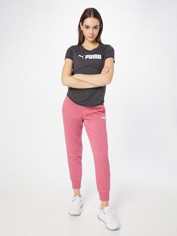 PUMATapered Sportske hlače 'Essentials' - ljubičasta boja