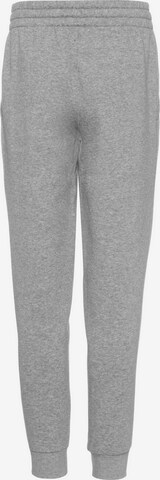 Effilé Pantalon 'Club' Nike Sportswear en gris