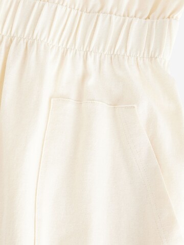 Rochie de la Next pe bej