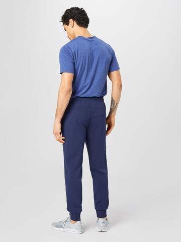 PUMA Tapered Sportbroek in Blauw