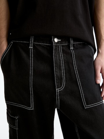Loosefit Jeans cargo Pull&Bear en noir