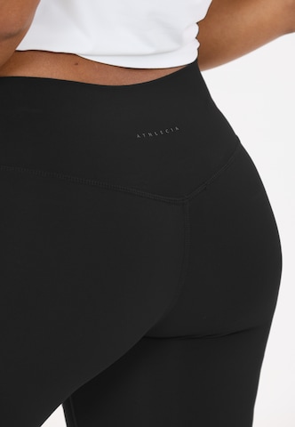 Athlecia Skinny Sports trousers 'Emarri' in Black
