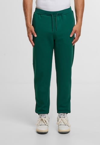 Sergio Tacchini Tapered Hose in Grün: Vorderseite