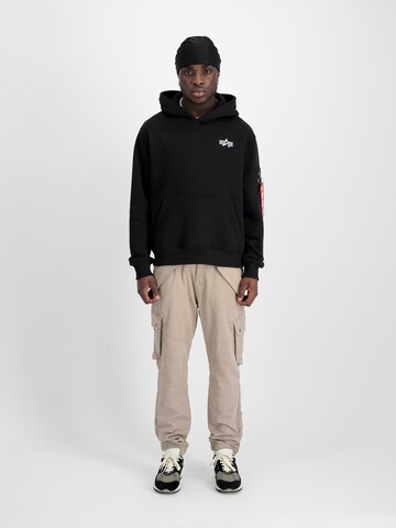 ALPHA INDUSTRIES Bluzka sportowa w kolorze czarny